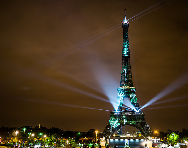 The Eiffel Tower in Paris is lit up as a virtual forest on November 29, 2015, during COP 21 as part of the “1 Heart 1 Tree” project to support reforestation. © Yann Caradec (CC BY-SA 2.0)